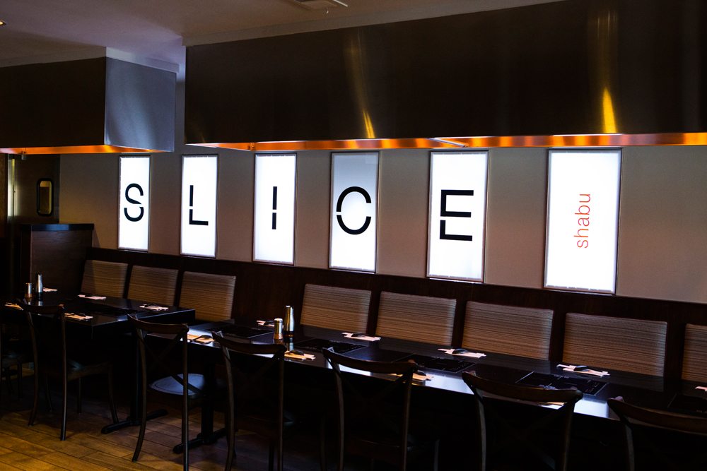 Interior decoration of LED Slice logo at Slice Huntington Beach