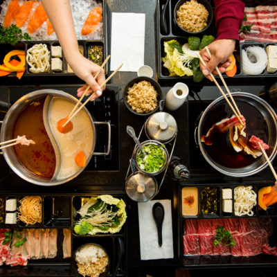 Top Down View of a dining table filled with Shabu